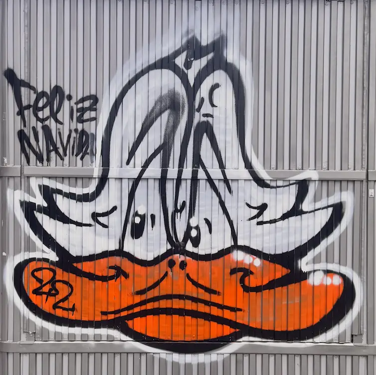 El Pato painted on a shutter in Madrid